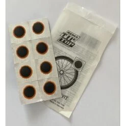 Sachet De 8 Rustines Rema TIPTOP 20mm -Magasin De Sport De Vélo sachet de 8 rustines rema tiptop 20mm 1